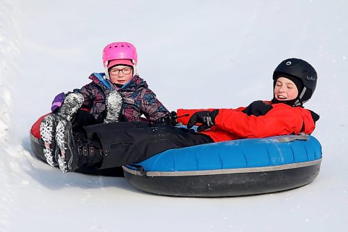 03012021
Sledding enthusiasts cruise down the tubing track at Tubin' at Grand Valley Park on a crisp Monday afternoon. (Tim Smith/The Brandon Sun)