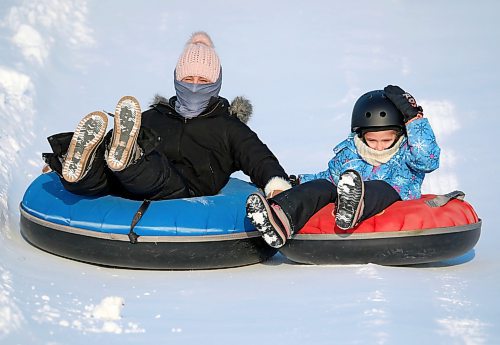 03012021
Sledding enthusiasts cruise down the tubing track at Tubin' at Grand Valley Park on a crisp Monday afternoon. (Tim Smith/The Brandon Sun)