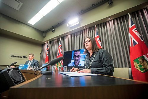 MIKAELA MACKENZIE / WINNIPEG FREE PRESS

Premier Heather Stefanson (right), deputy chief provincial public health officer Dr. Jazz Atwal (on screen), and education minister Cliff Cullen speak at a press conference announcing a week of remote learning in Winnipeg on Tuesday, Jan. 4, 2022. For Maggie/Carol story.
Winnipeg Free Press 2021.