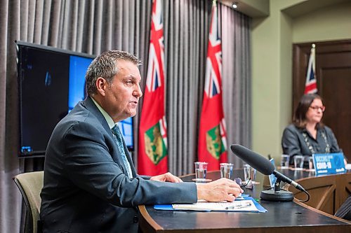 MIKAELA MACKENZIE / WINNIPEG FREE PRESS

Education minister Cliff Cullen (left), deputy chief provincial public health officer Dr. Jazz Atwal (on screen), and premier Heather Stefanson speak at a press conference announcing a week of remote learning in Winnipeg on Tuesday, Jan. 4, 2022. For Maggie/Carol story.
Winnipeg Free Press 2021.