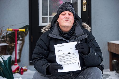 MIKAELA MACKENZIE / WINNIPEG FREE PRESS

Richard Kippen, a landlord who is so far on the hook for a tenantsՠunpaid water bill, poses for a portrait with a letter from the city in Winnipeg on Wednesday, Jan. 5, 2022. For Joyanne story.
Winnipeg Free Press 2022.