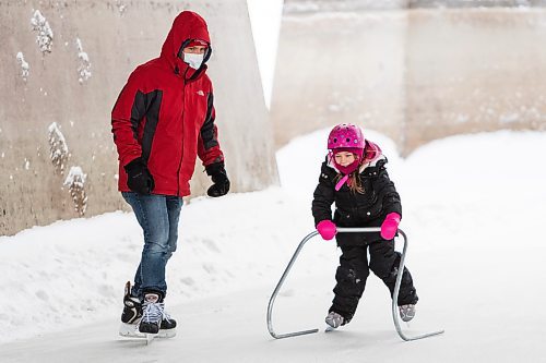 Daniel Crump / Winnipeg Free Press. A young person learns to skate on the river trail near the Forks in downtown Winnipeg on Saturday afternoon. The city enjoyed a slight reprieve from the frigid winter temperatures that dominated the forecast for much of the week. January 8, 2022.