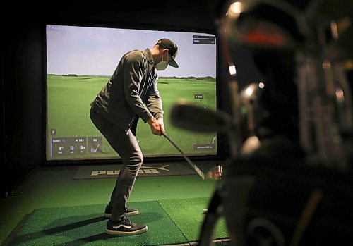 RUTH BONNEVILLE / WINNIPEG FREE PRESS

SPORTS - golf simulators

Photos taken at  Rossmere Golf &amp; Country Club, in one of their Golf Simulator booths (Sim Shack) as reporter Taylor Allen tries it out.  

Story on the local virtual golf scene in Winnipeg. Is it seeing a boom because of COVID?

Taylor Allen story 

Jan 10th,  2022
