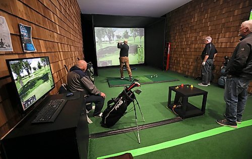 RUTH BONNEVILLE / WINNIPEG FREE PRESS

SPORTS - golf simulators

Photos taken at  Rossmere Golf &amp; Country Club, in one of their Golf Simulator booths (Sim Shack). with  Lori Thompson teeing off and his friends looking on.


Story on the local virtual golf scene in Winnipeg. Is it seeing a boom because of COVID?

Taylor Allen story 

Jan 10th,  2022

