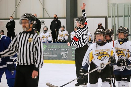 JOHN WOODS / WINNIPEG FREE PRESS
Luke Janus, 17, a referee for 5 years, works a game between the Predators and Titans at Seven Oaks Arena Monday, January 10, 2022. Reportedly it is becoming harder to book hockey referees because many of them are quitting the job due to unreasonable abuse and low wages.

Re: McIntyre