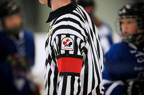 JOHN WOODS / WINNIPEG FREE PRESS
Luke Janus, 17, a referee for 5 years, works a game between the Predators and Titans at Seven Oaks Arena Monday, January 10, 2022. Reportedly it is becoming harder to book hockey referees because many of them are quitting the job due to unreasonable abuse and low wages.

Re: McIntyre