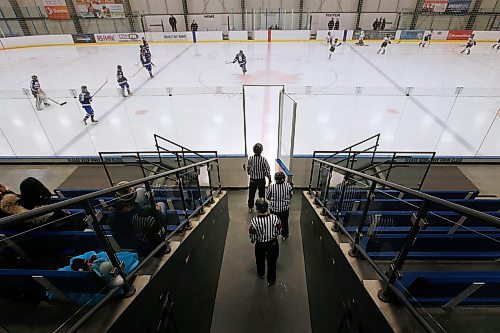 JOHN WOODS / WINNIPEG FREE PRESS
Luke Janus, 17, a referee for 5 years, works a game between the Predators and Titans at Seven Oaks Arena Monday, January 10, 2022. Reportedly it is becoming harder to book hockey referees because many of them are quitting the job due to unreasonable abuse and low wages.

Re: McIntyre