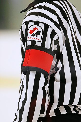 JOHN WOODS / WINNIPEG FREE PRESS
Luke Janus, 17, a referee for 5 years, works a game between the Predators and Titans at Seven Oaks Arena Monday, January 10, 2022. Reportedly it is becoming harder to book hockey referees because many of them are quitting the job due to unreasonable abuse and low wages.

Re: McIntyre