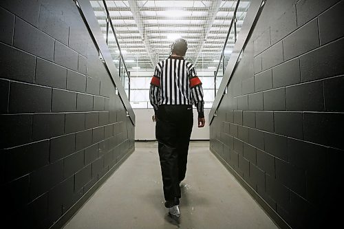 JOHN WOODS / WINNIPEG FREE PRESS
Luke Janus, 17, a referee for 5 years, works a game between the Predators and Titans at Seven Oaks Arena Monday, January 10, 2022. Reportedly it is becoming harder to book hockey referees because many of them are quitting the job due to unreasonable abuse and low wages.

Re: McIntyre