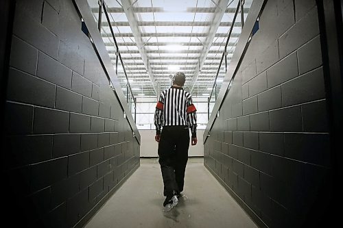 JOHN WOODS / WINNIPEG FREE PRESS
Luke Janus, 17, a referee for 5 years, works a game between the Predators and Titans at Seven Oaks Arena Monday, January 10, 2022. Reportedly it is becoming harder to book hockey referees because many of them are quitting the job due to unreasonable abuse and low wages.

Re: McIntyre