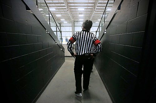 JOHN WOODS / WINNIPEG FREE PRESS
Luke Janus, 17, a referee for 5 years, works a game between the Predators and Titans at Seven Oaks Arena Monday, January 10, 2022. Reportedly it is becoming harder to book hockey referees because many of them are quitting the job due to unreasonable abuse and low wages.

Re: McIntyre