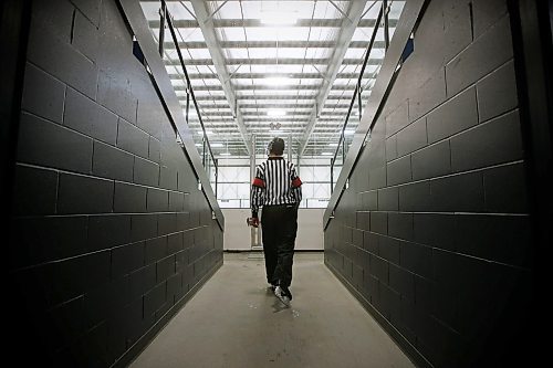 JOHN WOODS / WINNIPEG FREE PRESS
Luke Janus, 17, a referee for 5 years, works a game between the Predators and Titans at Seven Oaks Arena Monday, January 10, 2022. Reportedly it is becoming harder to book hockey referees because many of them are quitting the job due to unreasonable abuse and low wages.

Re: McIntyre