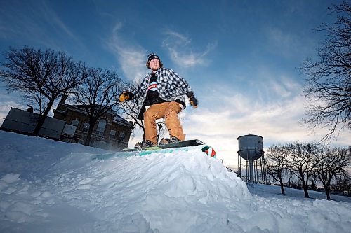 11012021
Eric Morken of Brandon grinds a rail while snowboarding at Rideau Park on a mild Tuesday. (Tim Smith/The Brandon Sun)