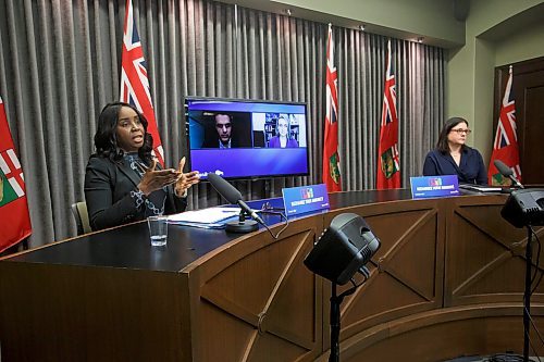 MIKE DEAL / WINNIPEG FREE PRESS
Premier Heather Stefanson (right), Health and Seniors Care Minister Audrey Gordon (left) and attending virtually, Dr. Jazz Atwal (left), deputy chief provincial public health officer, and Dr. Joss Reimer (right), medical lead, Vaccine Implementation Task Force, during the latest COVID-19 update at the Manitoba Legislative building Wednesday. 
220112 - Wednesday, January 12, 2022.