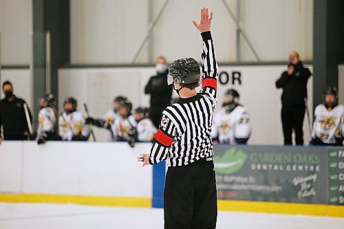 JOHN WOODS / WINNIPEG FREE PRESS

Luke Janus, 17, a referee for 5 years, works a game between the Predators and Titans at Seven Oaks Arena Monday, January 10, 2022. Reportedly it is becoming harder to book hockey referees because many of them are quitting the job due to unreasonable abuse and low wages.



Re: McIntyre