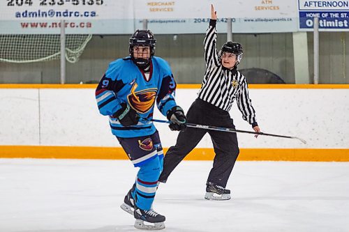 Daniel Crump / Winnipeg Free Press. Referee Camille Forbes lines a U15AAA game between the Bruins and the Thrashers game at Notre Dame arena. January 12, 2022.