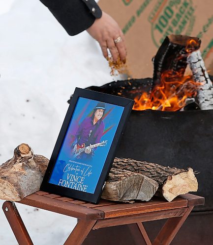 JOHN WOODS / WINNIPEG FREE PRESS
People place tobacco in a fire as they attend a memorial/celebration of life for musician Vince Fontaine at Oodena Circle at the Forks Sunday, January 16, 2022. 

Re: ?