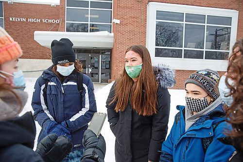 MIKE DEAL / WINNIPEG FREE PRESS
(from l-r) Riley Sloane-Seale, Iayana Kent, Nolan Swanson-Bilyk, and Sophie Piche grade 9 students from Kelvin High School took part in the walkout along with around 100 other students during the middle of class to raise awareness of lack of student safety. The walkout was organized by students at more than 75 schools.
See Maggie Macintosh story
220117 - Monday, January 17, 2022.