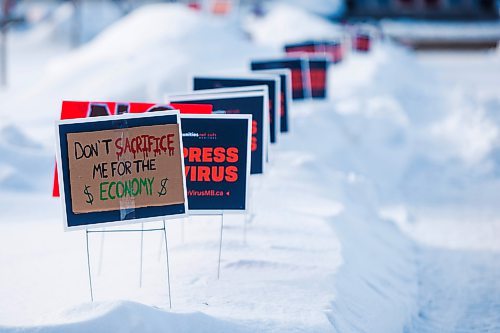 MIKAELA MACKENZIE / WINNIPEG FREE PRESS

A sign garden in support of and in solidarity with the Manitoba Students for COVID Safety Student Walkout on the legislative grounds in Winnipeg on Monday, Jan. 17, 2022. . For --- story.
Winnipeg Free Press 2022.