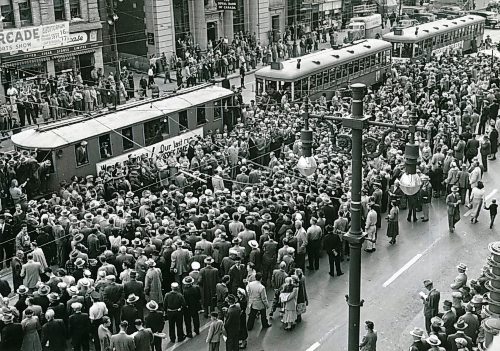 WINNIPEG FREE PRESS FILES
Image published: Sept. 20, 1955. Published caption: Hundreds of people Monday jammed the street at Portage and Main and crowded round the old street cars to witness the final brief ceremony marking the official end of streetcars in Winnipeg