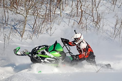 17012021
Luke McNabb plays in the deep snow near his home outside Minnedosa on his snowmobile on a blustery Tuesday afternoon.   (Tim Smith/The Brandon Sun)
