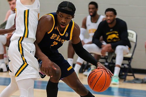 Anthony Tsegalkele of the Brandon University Bobcats drives towards the net against the University of Regina Cougars in a Canada West men&#x573; basketball game at the Healthy Living Centre Saturday. (Chelsea Kemp/The Brandon Sun)