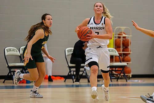 Reeta Tulkki of the Brandon University Bobcats drives for the net against the University of Regina Cougars in a Canada West women&#x573; basketball game at the Healthy Living Centre Friday. (Chelsea Kemp/The Brandon Sun)