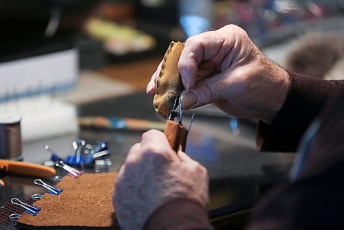 RUTH BONNEVILLE / WINNIPEG FREE PRESS

INTERSECTION - Fred Mitts

Intersection piece on Fred Mitts, a hobby biz  Fred Foster started some five years ago, after tinkering around, teaching himself to sew mitts and gloves using upscaled material such as old fur coats, old hides ... his bear-fur mitts are even fashioned out of an old bear-skin rug. 

Fred retired from his job as a plumber last year, but when he was working he found it therapeutic at night to come home and sew mitts.  Everybody told him he should be marketing his talents but it took him 16 years to give it a try; his mitts - all handsewn, he eschews a sewing machine even for liners - were an instant hit @ markets.

Photos of him,  a bit of a Grizzly Adams-type, working in his shop, outside showing off his wares, hand-sewn fur hat, with a pair of his fur mitts and inventory he has on display in his basement of completed projects - some super colourful dyed leather mitts (again, he uses recycled material almost exclusively 


See Dave Sanderson, Sat Jan 22 Intersection feature.

Jan 18th,  20227