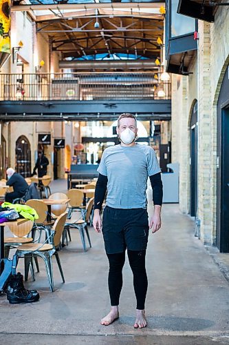 MIKAELA MACKENZIE / WINNIPEG FREE PRESS

Daniel Perry, who recently finished a 160 mile winter endurance cycling race, poses for a portrait in his base layers in Winnipeg on Wednesday, Jan. 19, 2022. For Ben Waldman story.
Winnipeg Free Press 2022.