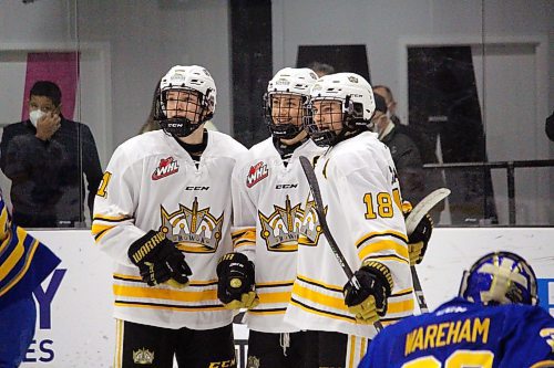 Brandon Wheat Kings forwards Clarke Caswell, left, Branden Keeble and Nolan Chastko celebrate after a second period goal at the J&amp;G Homes Arena Wednesday night. The Wheat Kings top three scorers combined for a nine-point outing as they helped their team cruise to a 7-1 victory over the Yellowhead Chiefs in Manitoba Under-18 AAA Hockey League action. (Lucas Punkari/The Brandon Sun)