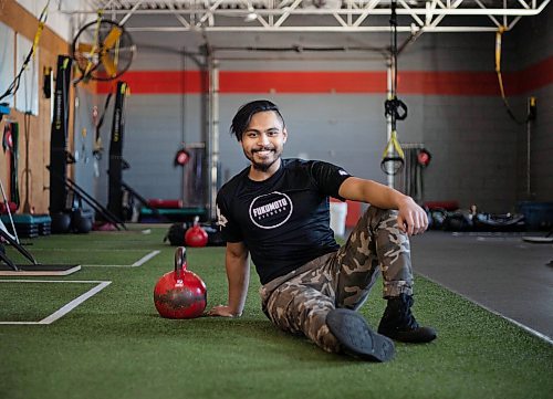 JESSICA LEE / WINNIPEG FREE PRESS

Nolan De Leon, 25, poses for a photo beside a kettle bell on January 20, 2022 at Fukumoto Fitness. In October, De Leon broke the Guinness World Record for heaviest weight lifted by Turkish get-up in one hour. He lifted a total of 5,897.2 kg using a 32 kg kettle bell. Along the way, he raised more than $3,500 for Mood Disorders Association of Manitoba.

Reporter: Aaron





