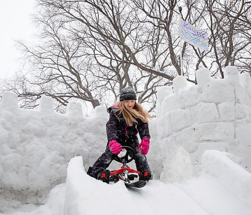 JESSICA LEE / WINNIPEG FREE PRESS

Kaya Raimbault is photographed going down the slide on a sled at the ice castle she built with the help of her neighbour Maurice &quot;Mo&quot; Barriault on January 21, 2022.

Reporter: Melissa





