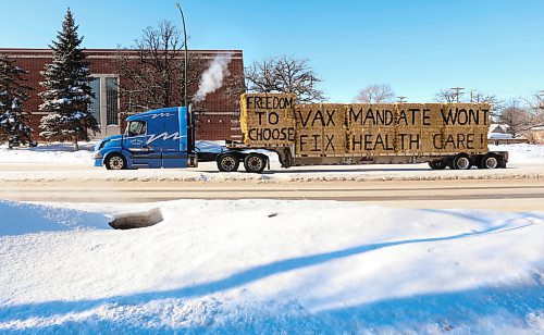 RUTH BONNEVILLE / WINNIPEG FREE PRESS

Local - Freedom Convoy

A semi truck carrying bushels of hay with sign posted on it was seen driving in a long convoy around down St. Mary's Rd to the perimeter Monday.  

Trucks varied in size from semis to pickup trucks, many displaying sigs to mandate freedom, others wanting consent over vaccines mandates. The convoy is part of a larger, Canada-wide convoy with estimates of  600 trucks, 70km long with many coming from the USA all headed to Ottawa.

Jan 24th,  20227