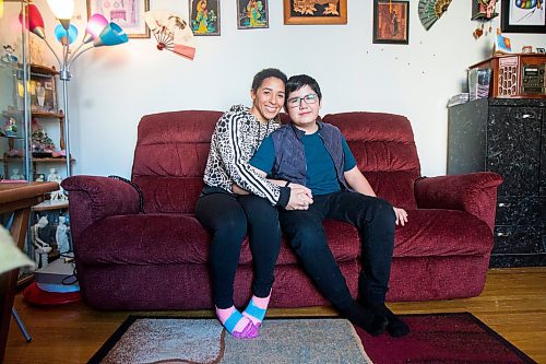 MIKAELA MACKENZIE / WINNIPEG FREE PRESS

Desiree Scott and her 11-year-old brother, DeeJay Sinclair, pose for a portrait in their home in Winnipeg on Thursday, Jan. 27, 2022.  For Mike Sawatzky story.
Winnipeg Free Press 2022.