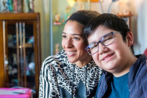 MIKAELA MACKENZIE / WINNIPEG FREE PRESS

Desiree Scott and her 11-year-old brother, DeeJay Sinclair, pose for a portrait in their home in Winnipeg on Thursday, Jan. 27, 2022.  For Mike Sawatzky story.
Winnipeg Free Press 2022.