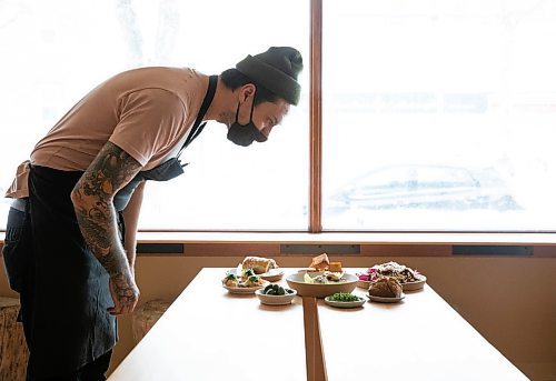 JESSICA LEE / WINNIPEG FREE PRESS

Keegan Misanchuk, a chef at One Sixteen restaurant, is photographed inspecting food on January 26, 2022.

Reporter: Eva + Ben S





