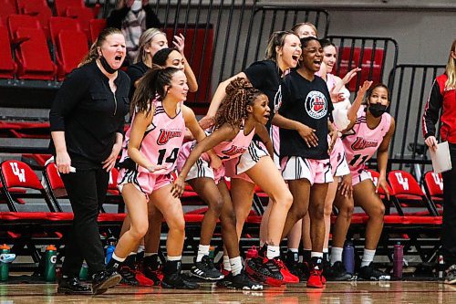 Daniel Crump / Winnipeg Free Press. The Winnipeg Wesmen women&#x573; basketball team celebrates in the dying moments of their game against the Saskatchewan Huskies at Duckworth Centre at the University of Winnipeg in Winnipeg. Going into the night both teams were undefeated  this season. January 28, 2022.