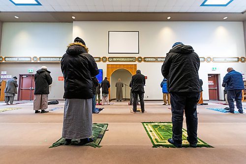 Daniel Crump / Winnipeg Free Press. People take part in the 1pm prayer, lead by Prayer Leader Atef Ibrahim, at the Grand Mosque in Winnipeg. Today marks the fifth anniversary of the Quebec mosque shooting when six people were killed and 19 injured by a gunman who opened fire at the mosque. January 29, 2022.