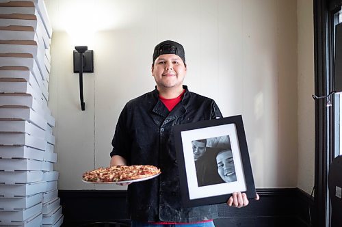 JESSICA LEE / WINNIPEG FREE PRESS

Jack Colombe, co-owner of Thompson-Style Pizza, holds a Shane Special and a photo of his brother on January 28, 2022. The Shane Special is named for Colombe&#x2019;s brother who took his own life three years ago.

Reporter: Dave



