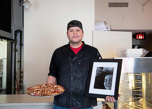 JESSICA LEE / WINNIPEG FREE PRESS

Jack Colombe, co-owner of Thompson-Style Pizza, holds a Shane Special and a photo of his brother on January 28, 2022. The Shane Special is named for Colombe&#x2019;s brother who took his own life three years ago.

Reporter: Dave




