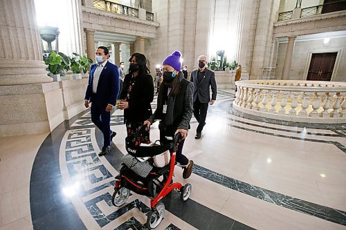 JOHN WOODS / WINNIPEG FREE PRESS
Melissa Carter, with her mother Florinda Apalit, leave a press conference after speaking Carter spoke about her elderly father at a press conference at the Manitoba Legislature, Monday, January 31, 2022. Mr. Apalit was transferred from Concordia Hospital to Minnedosa.

Re: Danielle