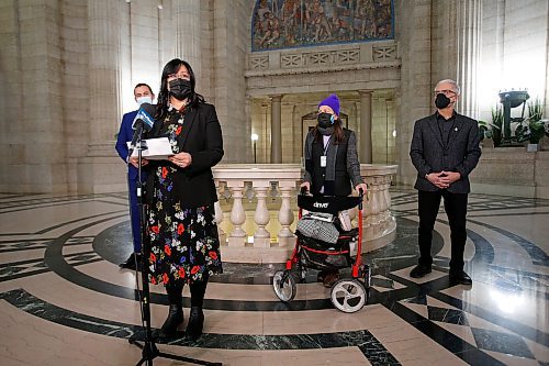 JOHN WOODS / WINNIPEG FREE PRESS
As NDP leader Wab Kinew, left, and MLA Nello Altomare, right, listen in, Melissa Carter, with her mother Florinda Apalit, speaks about her elderly father at a press conference at the Manitoba Legislature, Monday, January 31, 2022. Mr. Apalit was transferred from Concordia Hospital to Minnedosa.

Re: Danielle