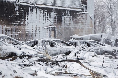 MIKAELA MACKENZIE / WINNIPEG FREE PRESS

The scene of the fire, which burned down a condo complex under construction and singed nearby buildings, on Kimberly Avenue in Winnipeg on Tuesday, Feb. 1, 2022. For --- story.
Winnipeg Free Press 2022.