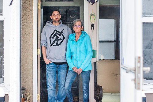 MIKAELA MACKENZIE / WINNIPEG FREE PRESS

Wendy Petrushak and her son, Graeme Mohr, pose for a photo in her condo, which they had to flee because of the Kimberly fire, in Winnipeg on Tuesday, Feb. 1, 2022. For Chris Kitching story.
Winnipeg Free Press 2022.