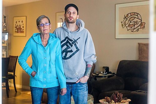 MIKAELA MACKENZIE / WINNIPEG FREE PRESS

Wendy Petrushak and her son, Graeme Mohr, pose for a photo in her condo, which they had to flee because of the Kimberly fire, in Winnipeg on Tuesday, Feb. 1, 2022. For Chris Kitching story.
Winnipeg Free Press 2022.