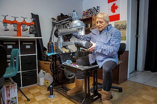 MIKE DEAL / WINNIPEG FREE PRESS
Genoveva at a sewing machine meant for sticking through layers of leather.
Genoveva and Nikolay Karapeneva in their shoe repair shop Wednesday morning.
moved to Winnipeg from Bulgaria in 2016, where their only daughter (and only grandson) were already living. The couple had been in the shoe-repair biz for most of their working lives already, so after spending close to a year learning how to speak English, they opened a shop in Old St. Vital and, during the height of COVID, got their Canadian citizenship during a Zoom ceremony.
See Dave Sanderson story
220202 - Wednesday, February 02, 2022.