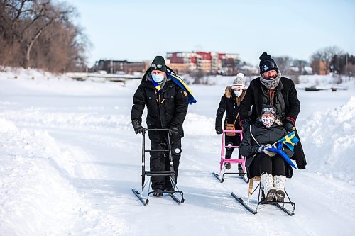 MIKAELA MACKENZIE / WINNIPEG FREE PRESS

Urban Ahlin, the Swedish Ambassador to Canada (left), Diana King, Honorary Consul for Norway and Sweden, Anders Swanson of Trails Winnipeg, and Marilyn Ekelund, Swedish Association board member (seated), go on a kicksledding jaunt around The Forks in Winnipeg on Thursday, Feb. 3, 2022. For Eva Wasney story.
Winnipeg Free Press 2022.