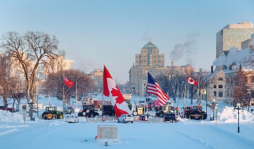 MIKE DEAL / WINNIPEG FREE PRESS
Protesters block the entrance to the Manitoba Legislative building on Broadway Avenue and have parked their trucks along Memorial early Friday morning.
220204 - Friday, February 04, 2022.