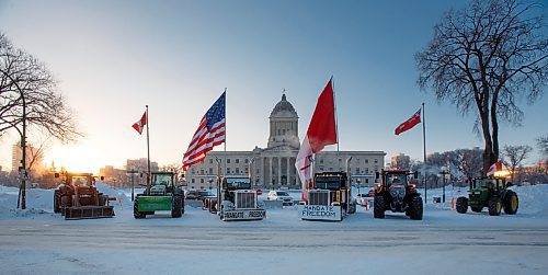 MIKE DEAL / WINNIPEG FREE PRESS
Protesters block the entrance to the Manitoba Legislative building on Broadway Avenue and have parked their trucks along Memorial early Friday morning.
220204 - Friday, February 04, 2022.