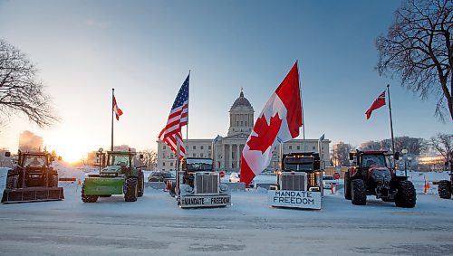 MIKE DEAL / WINNIPEG FREE PRESS
Protesters block the entrance to the Manitoba Legislative building on Broadway Avenue and have parked their trucks along Memorial early Friday morning.
220204 - Friday, February 04, 2022.